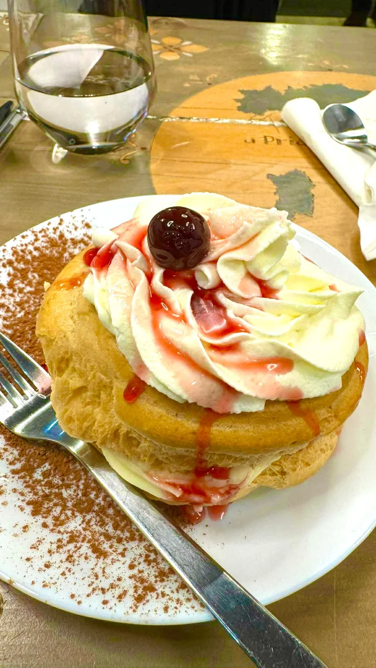 A cream-topped dessert served at a Pria